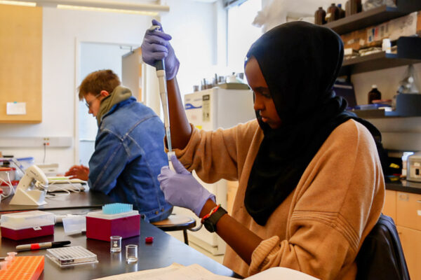 Students conducting a chemical experiment.