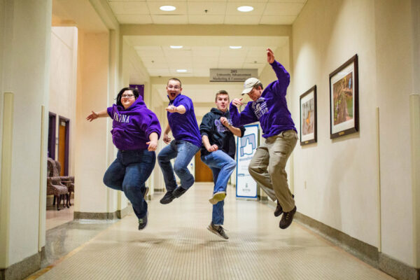 A group of students in the hallway of Somsen Hall.