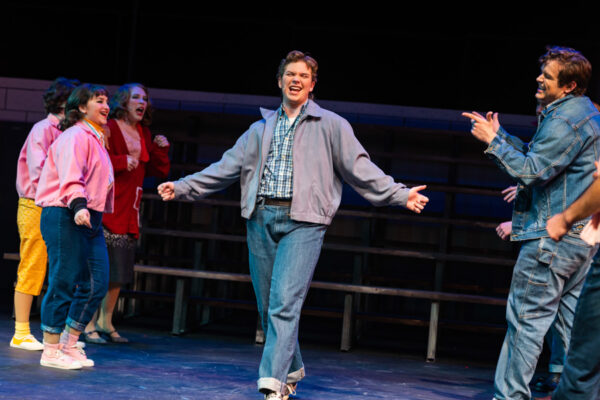 Actors perform on stage during a theatre production at WSU.