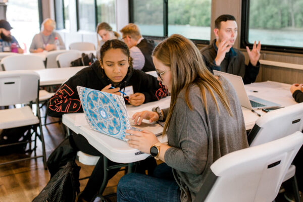 Students participate in a class aboard the Cal Fremling boat.