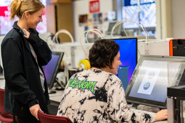 Students work on the tablet computers in the Design Production Lab on the WSU campus.