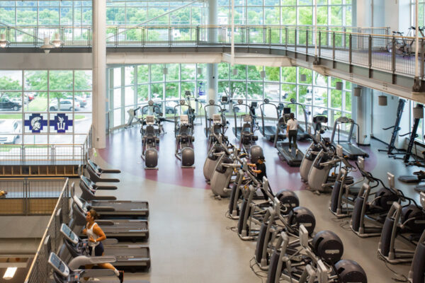 Students work out with exercise equipment in the Fitness Center on the WSU campus.