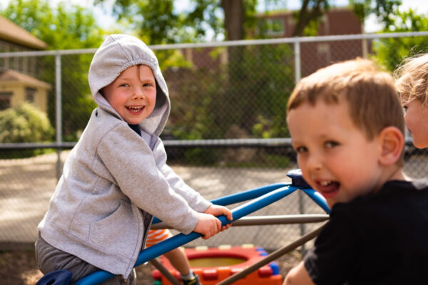 Several children have fun at the WSU Children's Center playground.