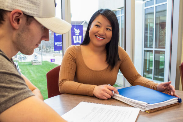 Two students study together in a lounge on the WSU campus.