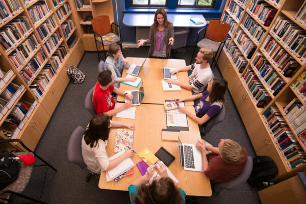 Students work as group in a study room in Phelps Hall.